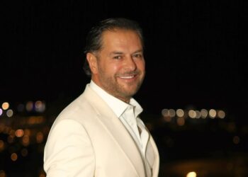 باسل خياط وزوجته ناهد في معرض ديور