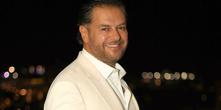 باسل خياط وزوجته ناهد في معرض ديور